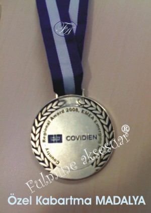 KABARTMA &Ouml;ZEL MADALYA